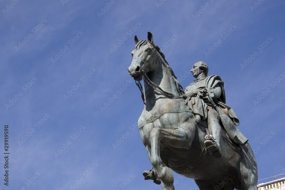 Madrid - Statue of Carlos III against blue sky, Puerta del Sol