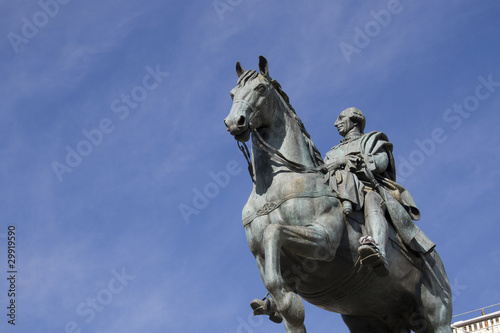 Madrid - Statue of Carlos III against blue sky, Puerta del Sol