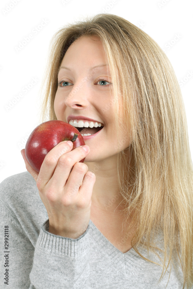 Woman biting into an apple Woman biting into an apple
