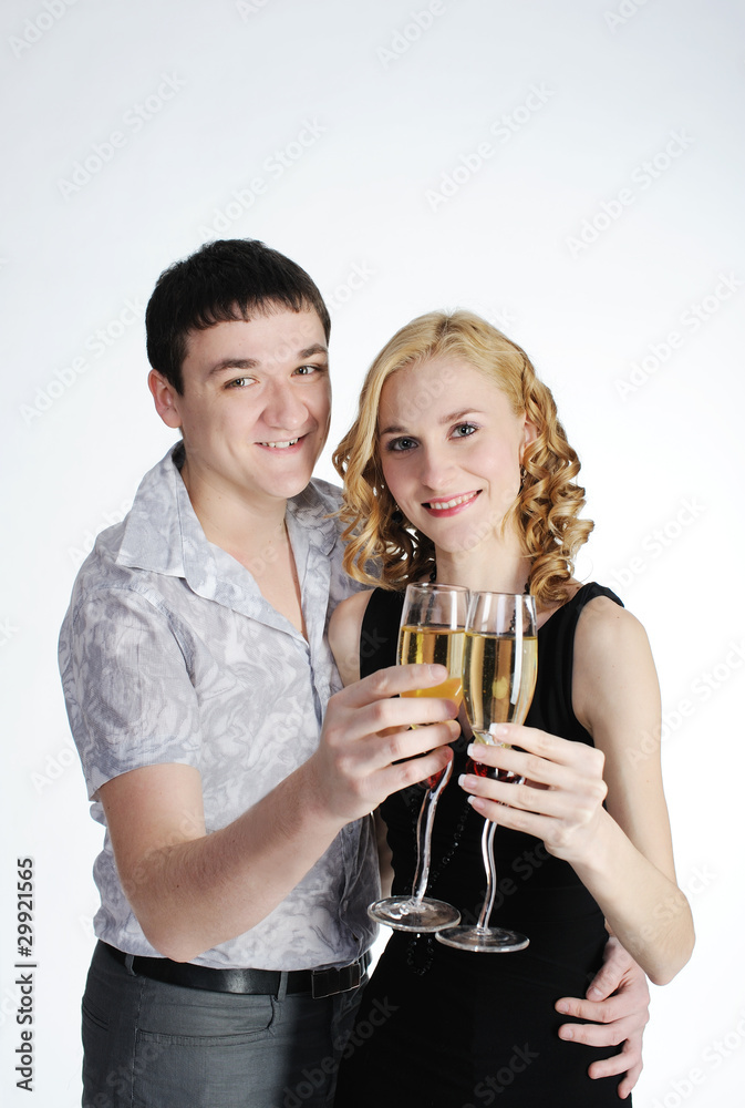 Couple of young girl and man drink champagne Couple of young girl and man drink champagne
