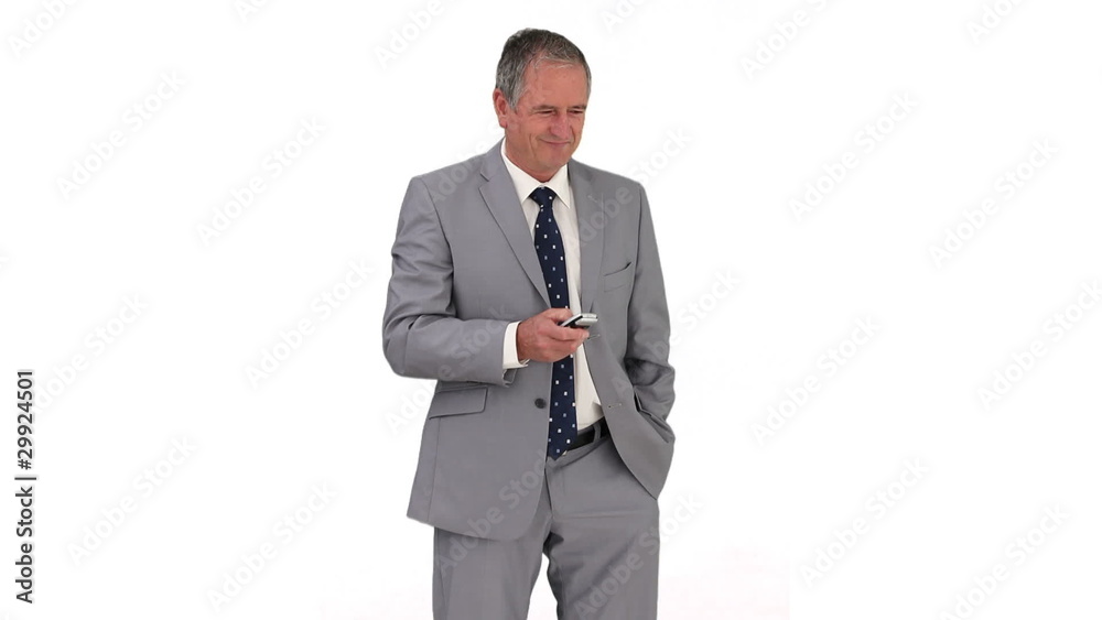 Businessman in gray suit having a phone call Businessman in gray suit having a phone call