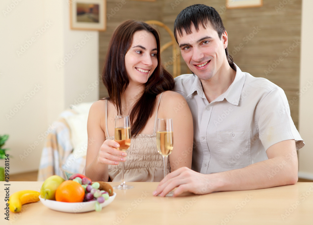 young couple at home having meal