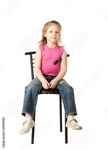 girl sitting on chair