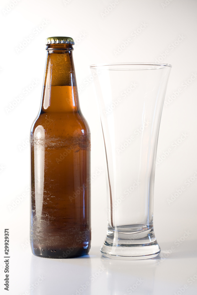 Bottle of beer with glass