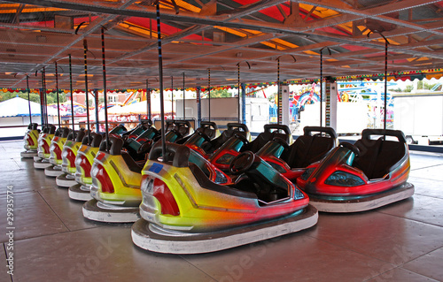 Two Rows of Dodgem Cars on a Fun Fair Ride. © daseaford