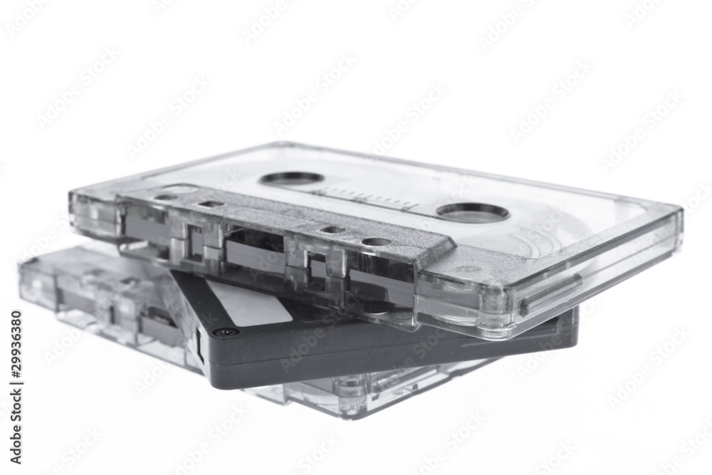 Old magnetic audio tape cassette isolated on white Old magnetic audio tape cassette isolated on white