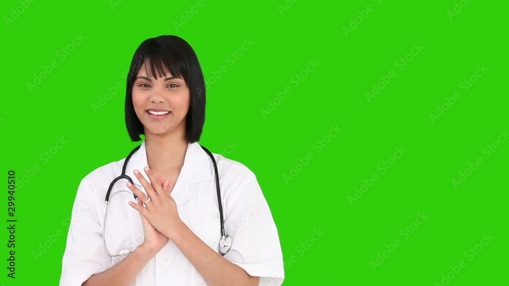 Asian nurse with a stethoscope looking at the camera Asian nurse with a stethoscope looking at the camera