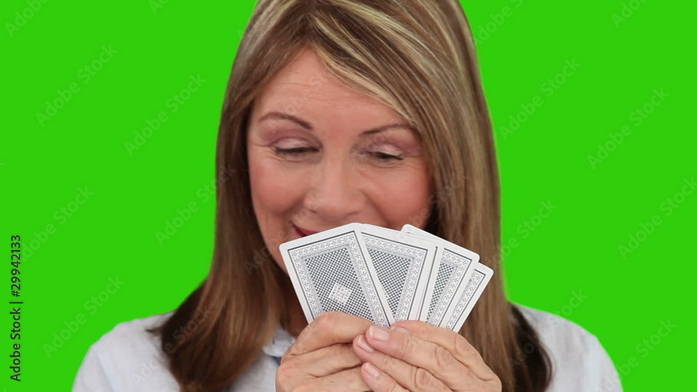 Elderly woman playing with cards Elderly woman playing with cards
