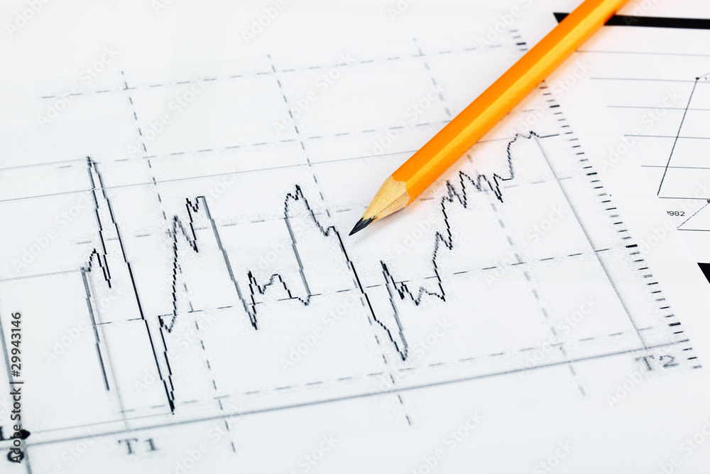 financial charts and graphs on the table financial charts and graphs on the table