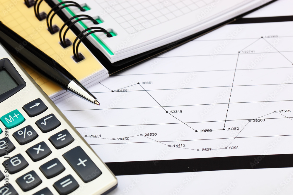 financial charts and graphs on the table financial charts and graphs on the table