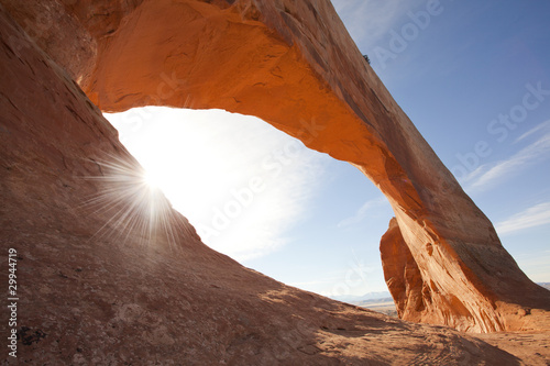 Image of Wilson Arch in Moab, Utah with sunstar photo