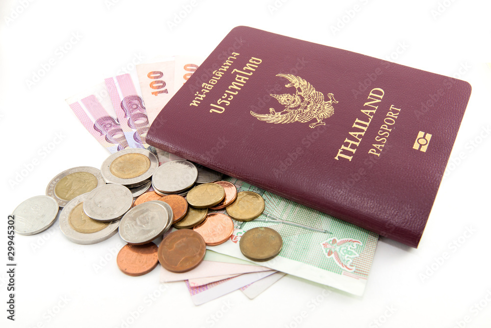 Thailand passport and Thai money on white background Thailand passport and Thai money on white background