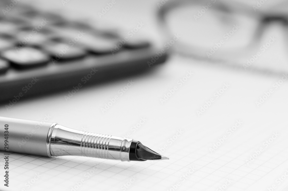 Business concept with notepad and calculator Business concept with notepad and calculator