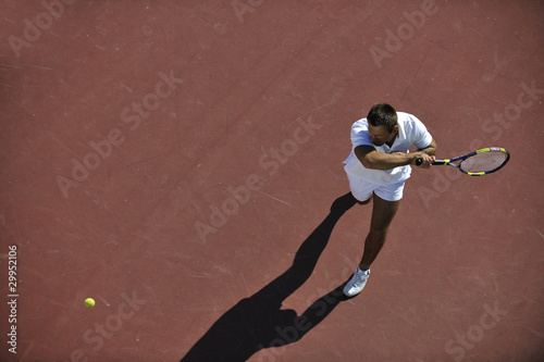 young man play tennis © .shock