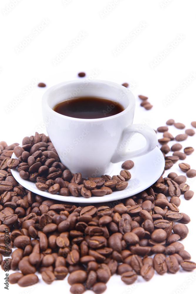 Cup with coffee and beams. Focus on coffee beans Cup with coffee and beams. Focus on coffee beans