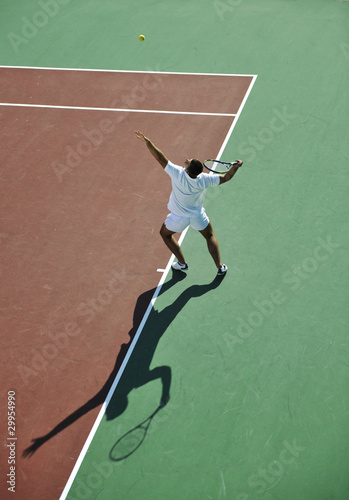 young man play tennis © .shock