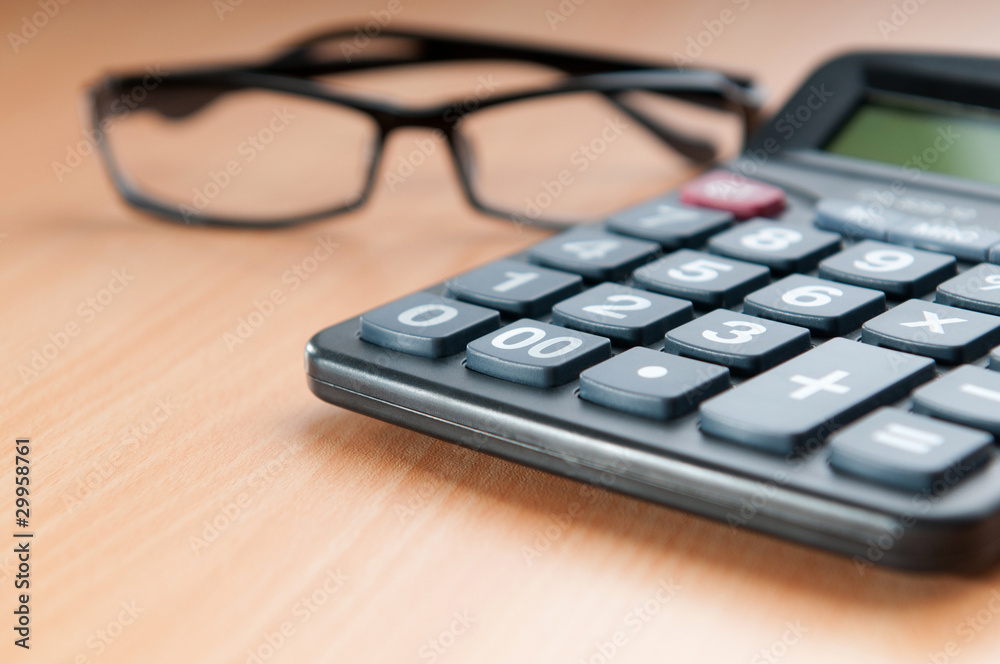 Business concept with accounting calculator Business concept with accounting calculator