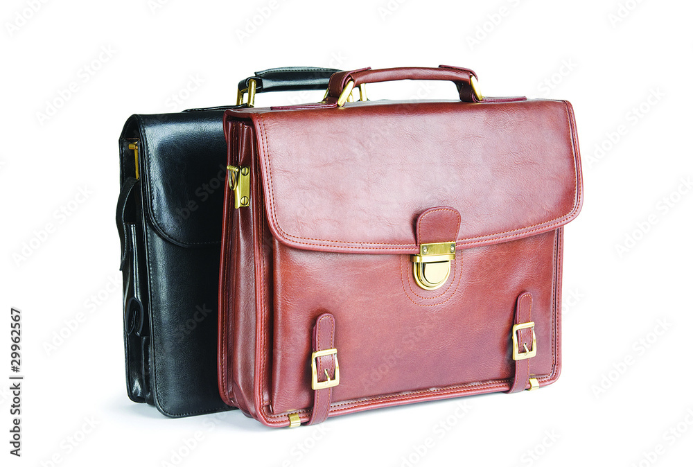 Two leather briefcases isolated on the white Two leather briefcases isolated on the white