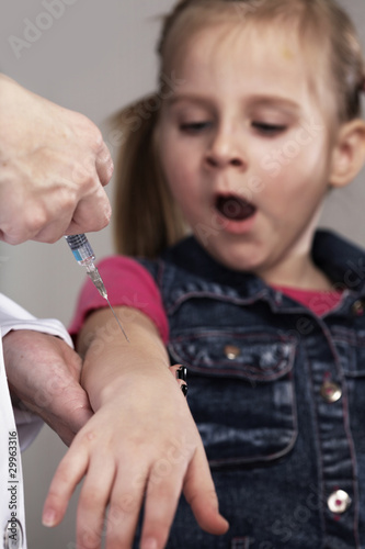 Children - vaccination of girl photo