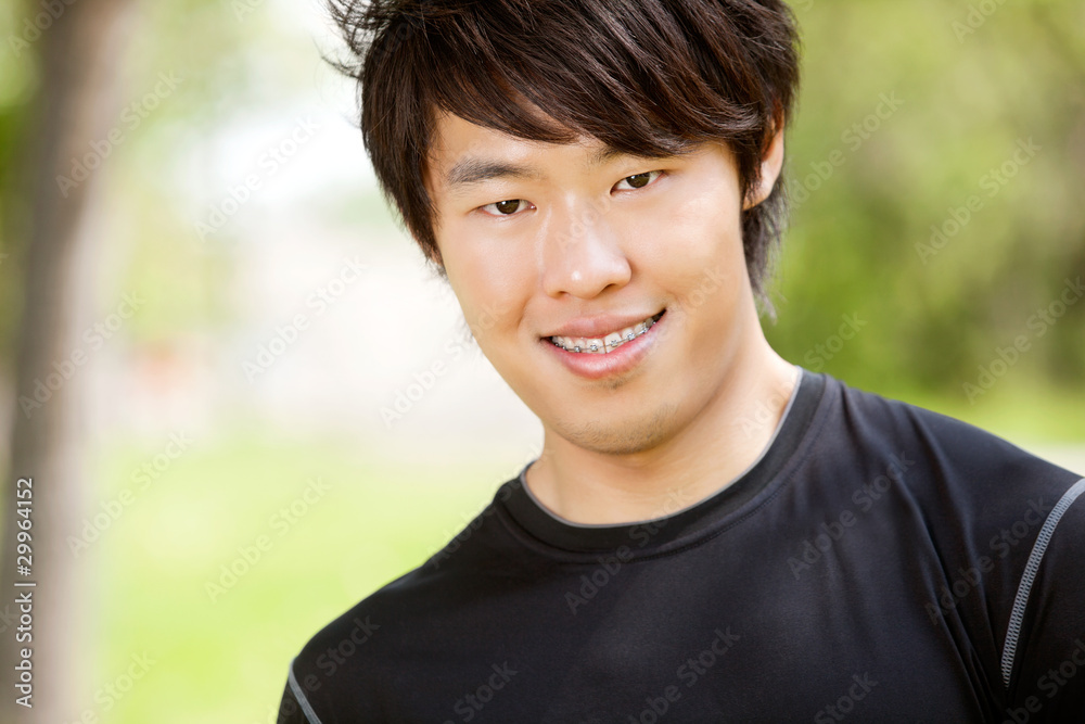Portrait of a young man smiling Portrait of a young man smiling