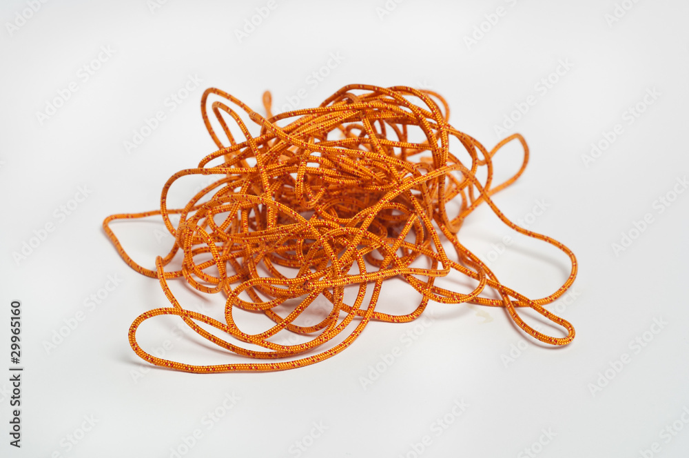 Orange string tangled up Stock Photo