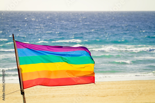 gay flag at the beach