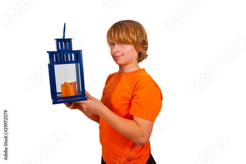 cute boy holding a hand lantern