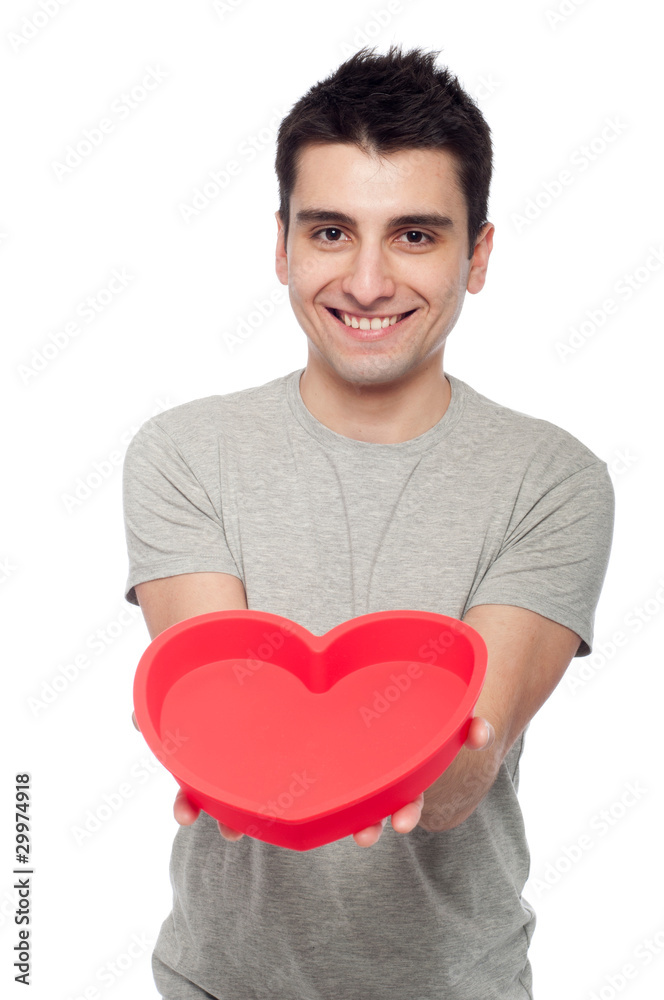 Casual man holding heart Casual man holding heart