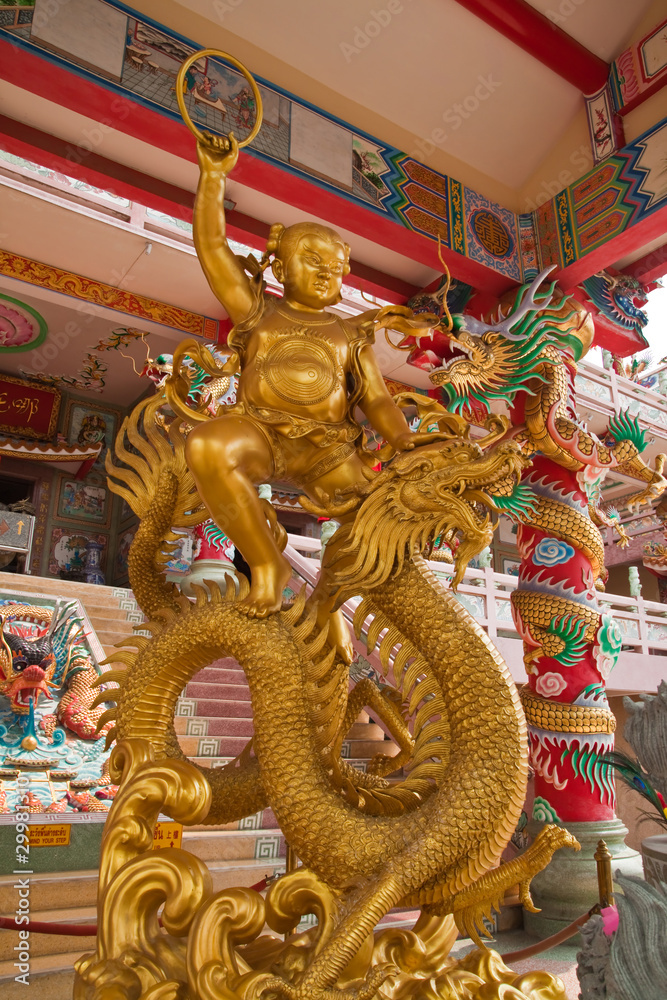Sculpture of kid Naja in Chinese Temple,East of Thailand