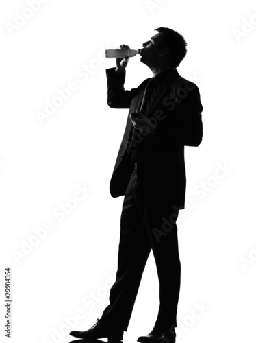 silhouette man drinking