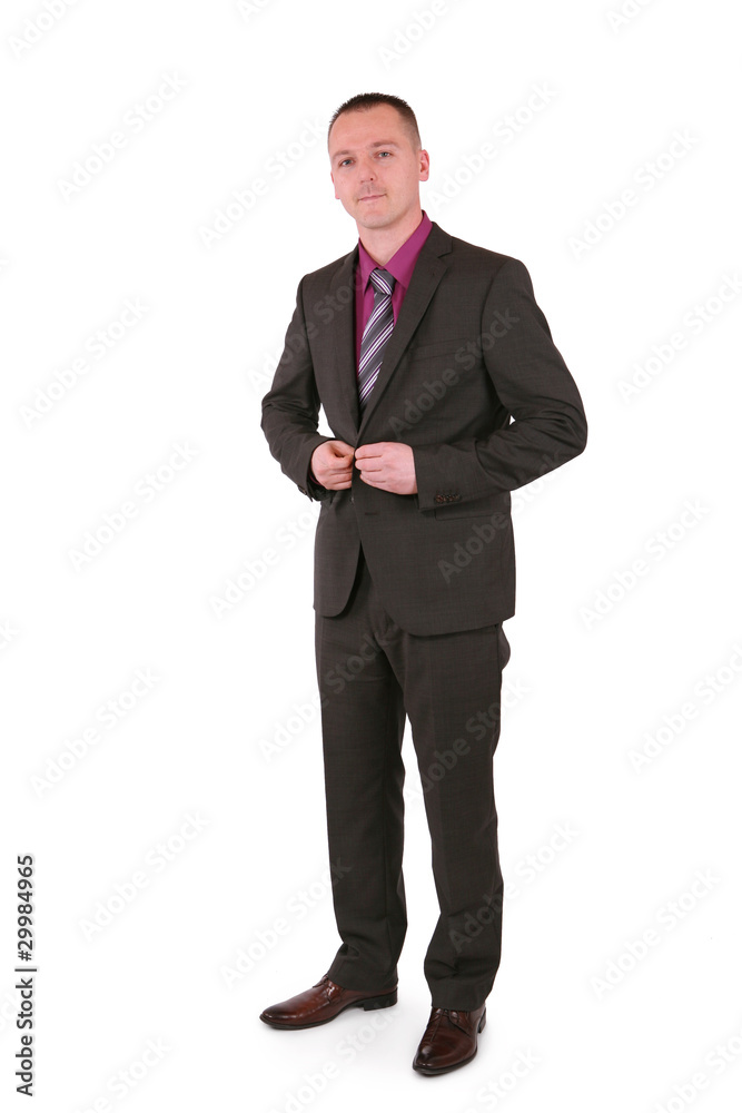 Businessman buttons up his jacket Businessman buttons up his jacket