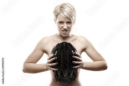 Young, beautiful woman with bicycle helmet