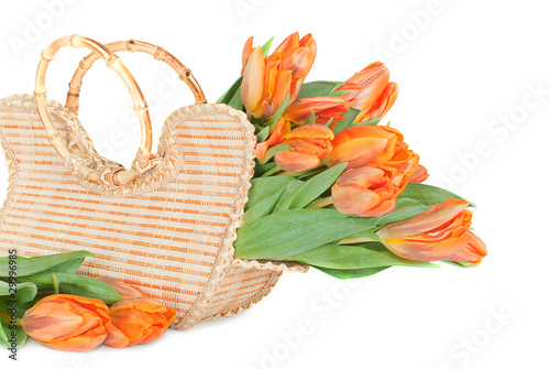 Tulips in the wicker handbag