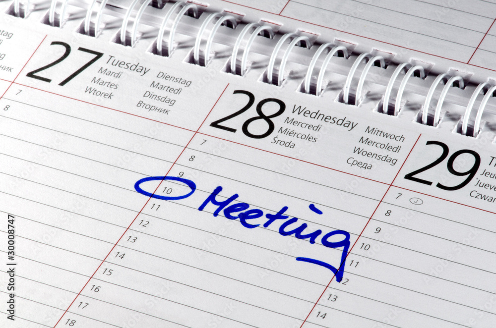 Kalender mit Eintrag Meeting Kalender mit Eintrag Meeting