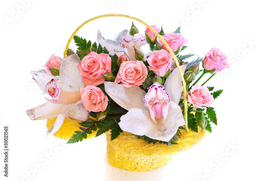 Fototapeta Naklejka Na Ścianę i Meble -  Bright flower bouquet in basket isolated on white