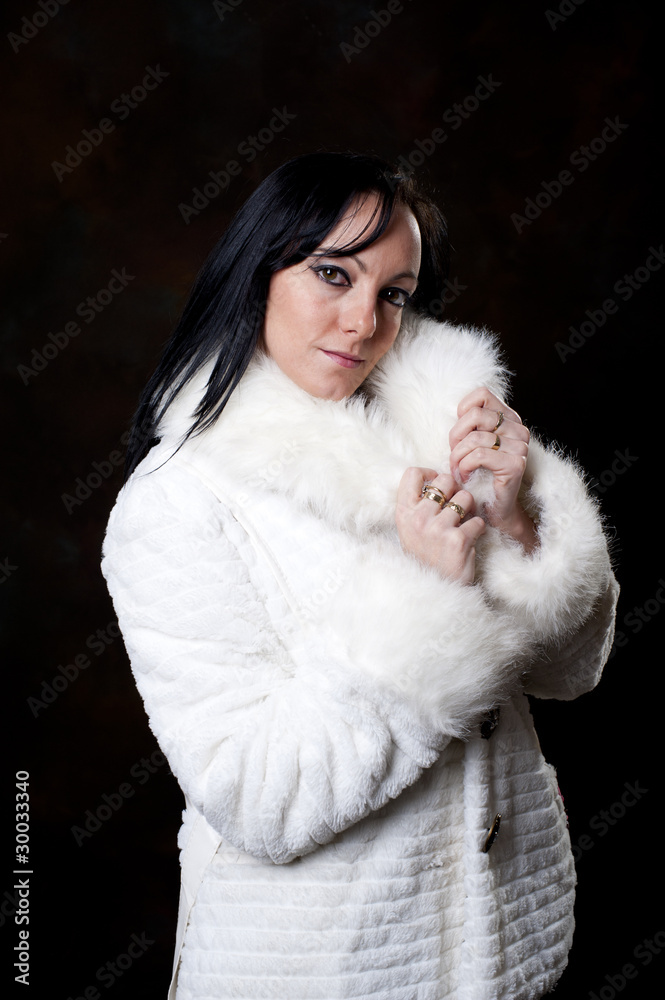 Beautiful young female in fur coat Beautiful young female in fur coat