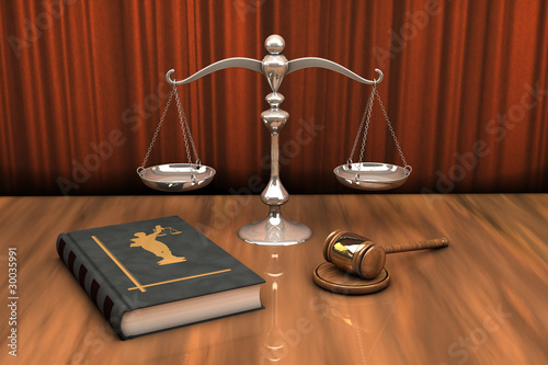 Gavel, scale and law book on the table