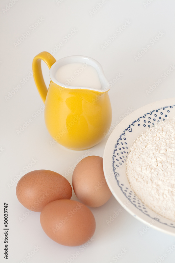 Pitcher of milk, eggs and flour Pitcher of milk, eggs and flour