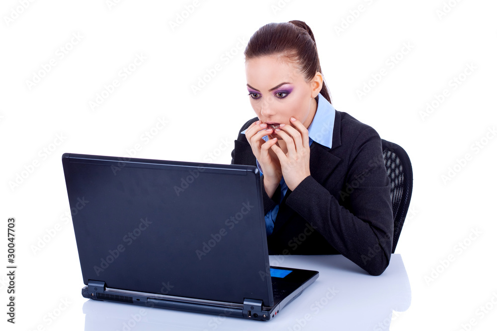 amazed business woman at her laptop amazed business woman at her laptop