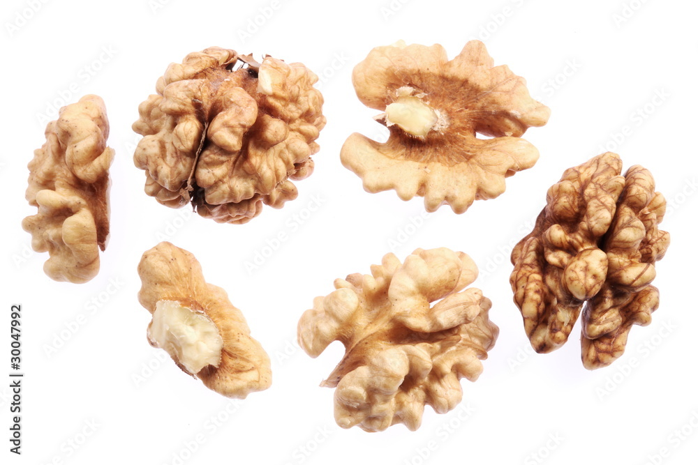 Walnut kernels isolated on a white background. Walnut kernels isolated on a white background.