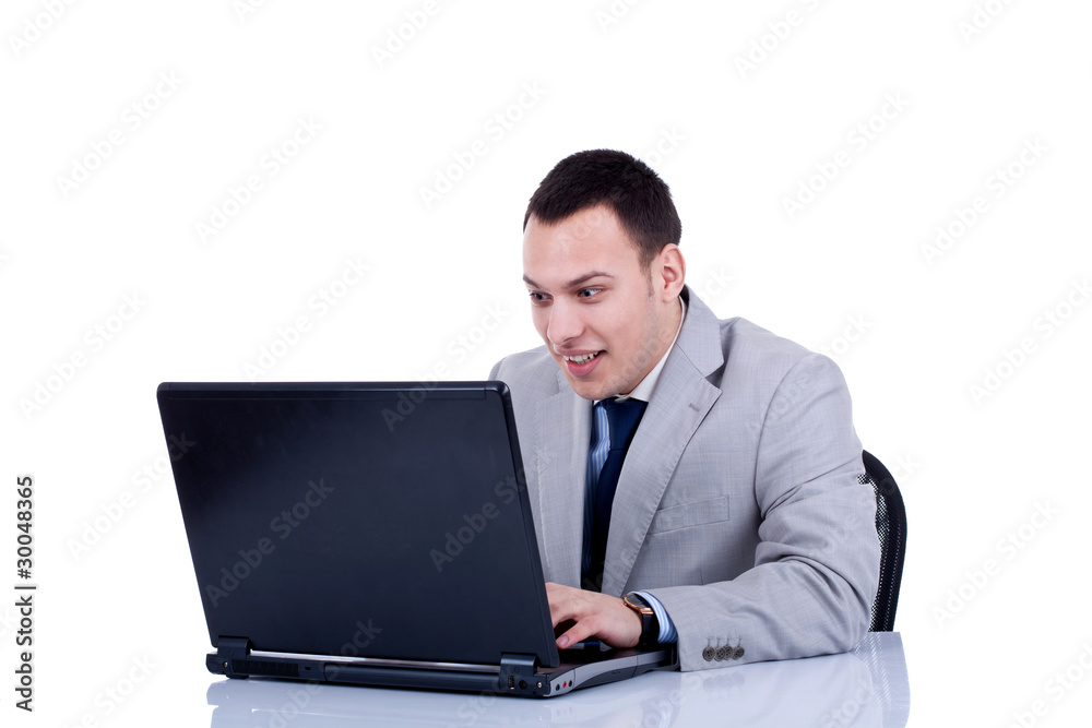amased business man at his laptop amased business man at his laptop