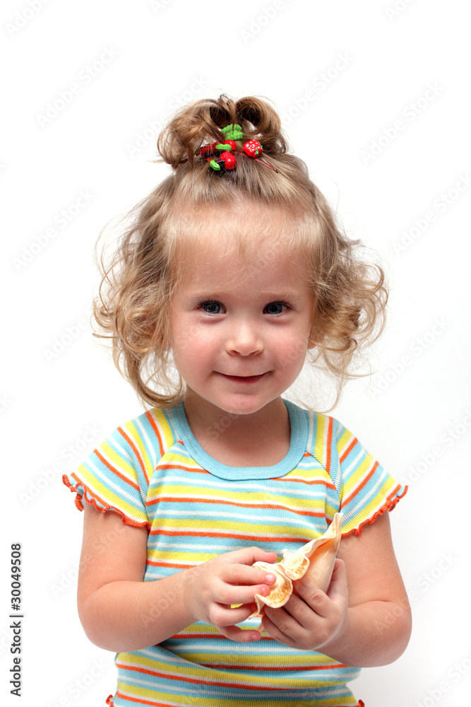 cute little girl playing with seashell cute little girl playing with seashell
