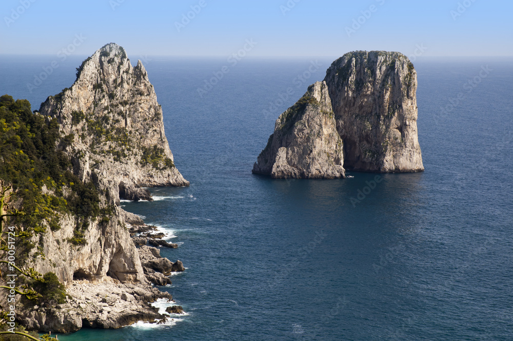 The iconic Faraglioni Rocks off the island of Capri in Italy