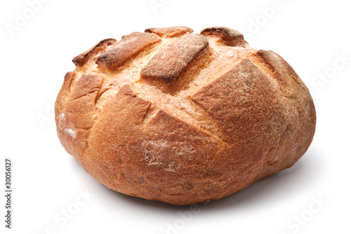 Traditional homemade round bread isolated on a white background