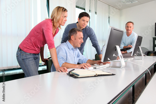 Office workers in a training course