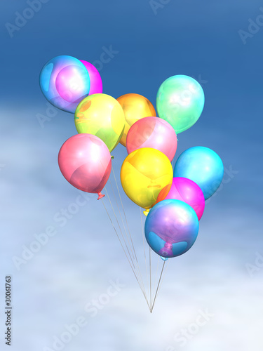 Colorful balloons drifting in the sky