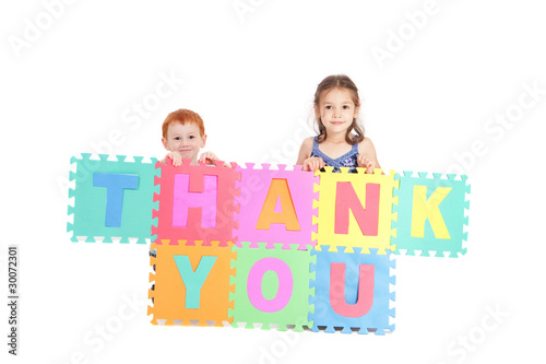Kids holding thankyou sign