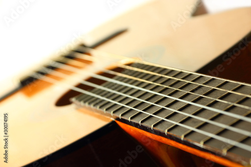 Details of classic spanish wooden guitar photo