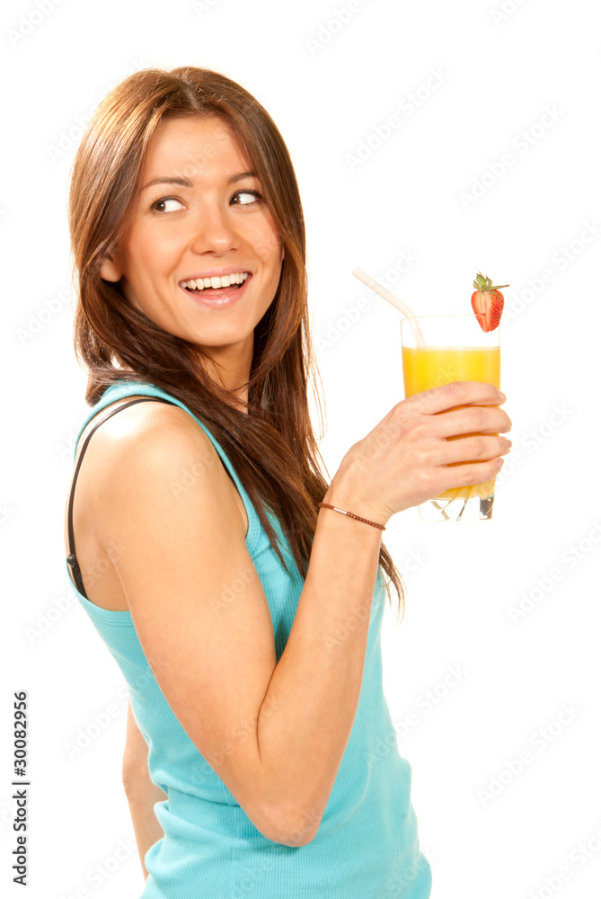 Woman drinking orange juice cocktail with strawberry Woman drinking orange juice cocktail with strawberry
