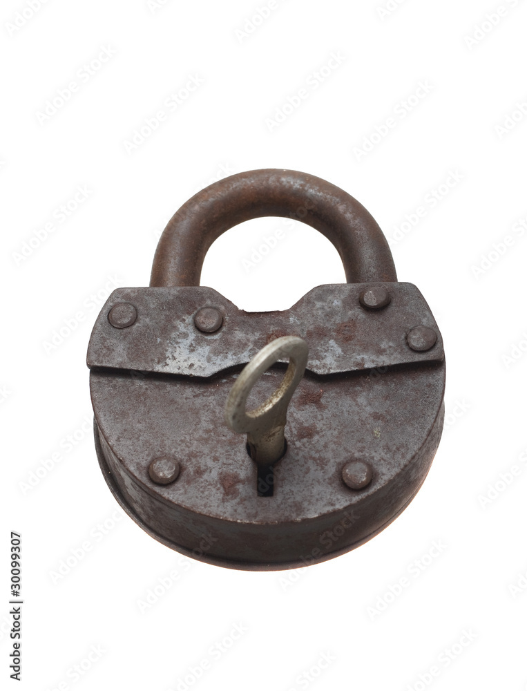 Lock and key on a white background (isolated). Lock and key on a white background (isolated).
